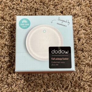 Dodow Sleep Aid device.